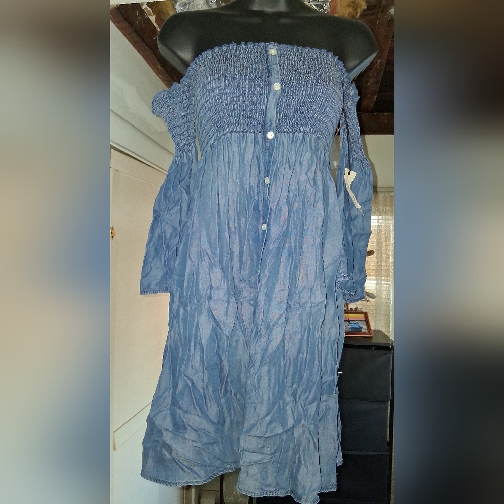 Off-Shoulder Blue Denim Dress With Bell Sleeves..